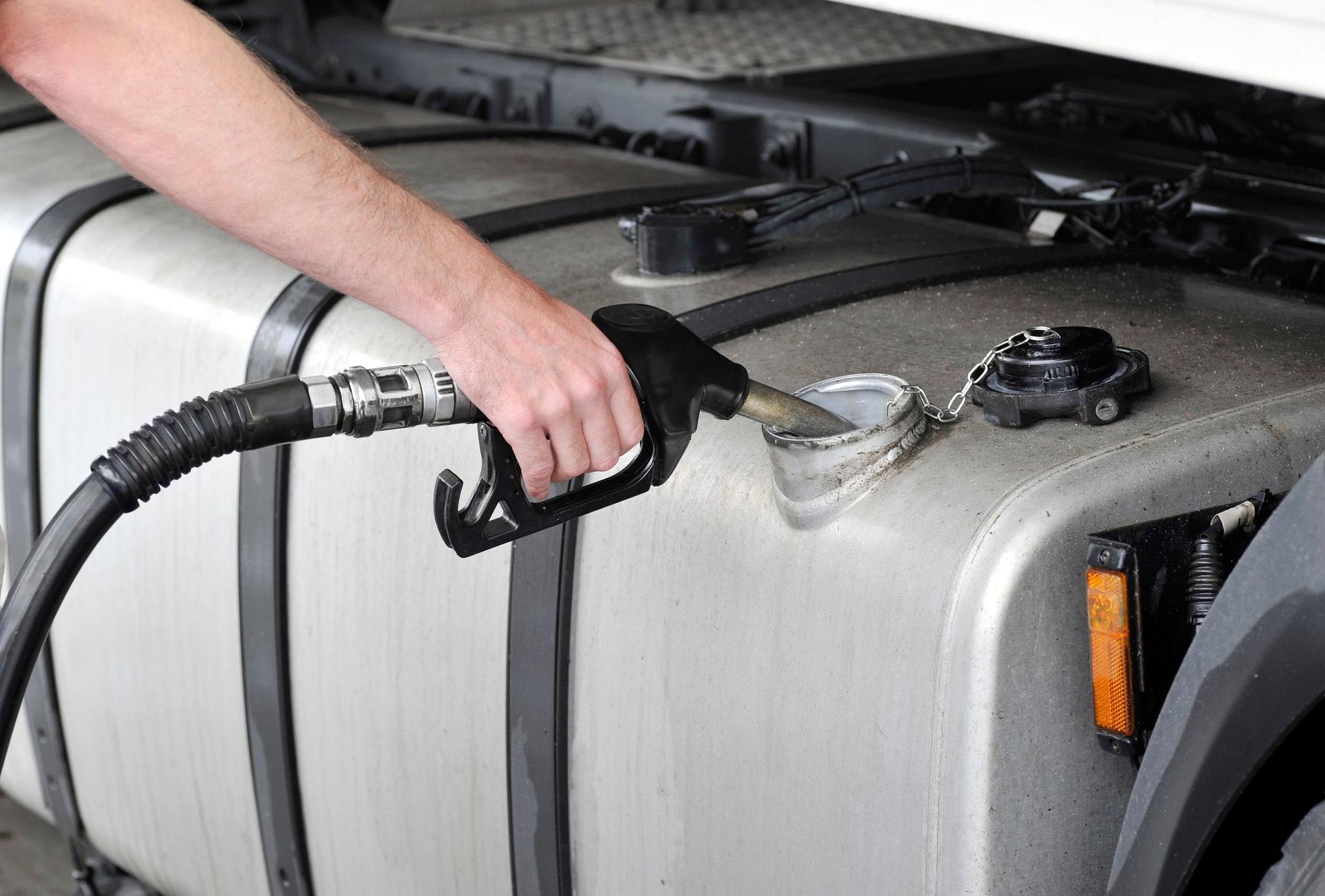 Filling the gas tank.